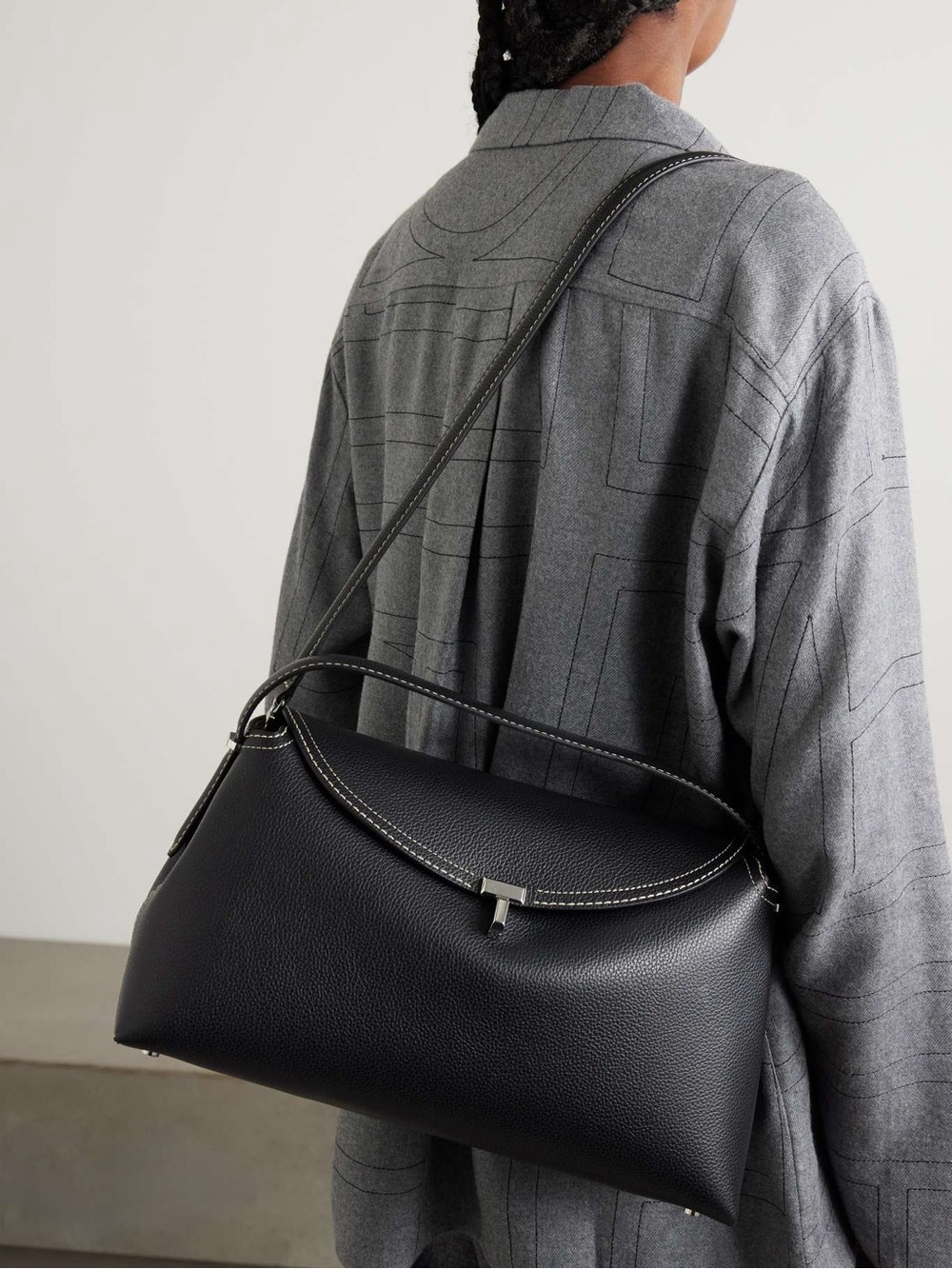 TOTEME T-Lock textured-leather shoulder bag in Black